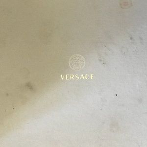 Only worn 1 time Versace Heels